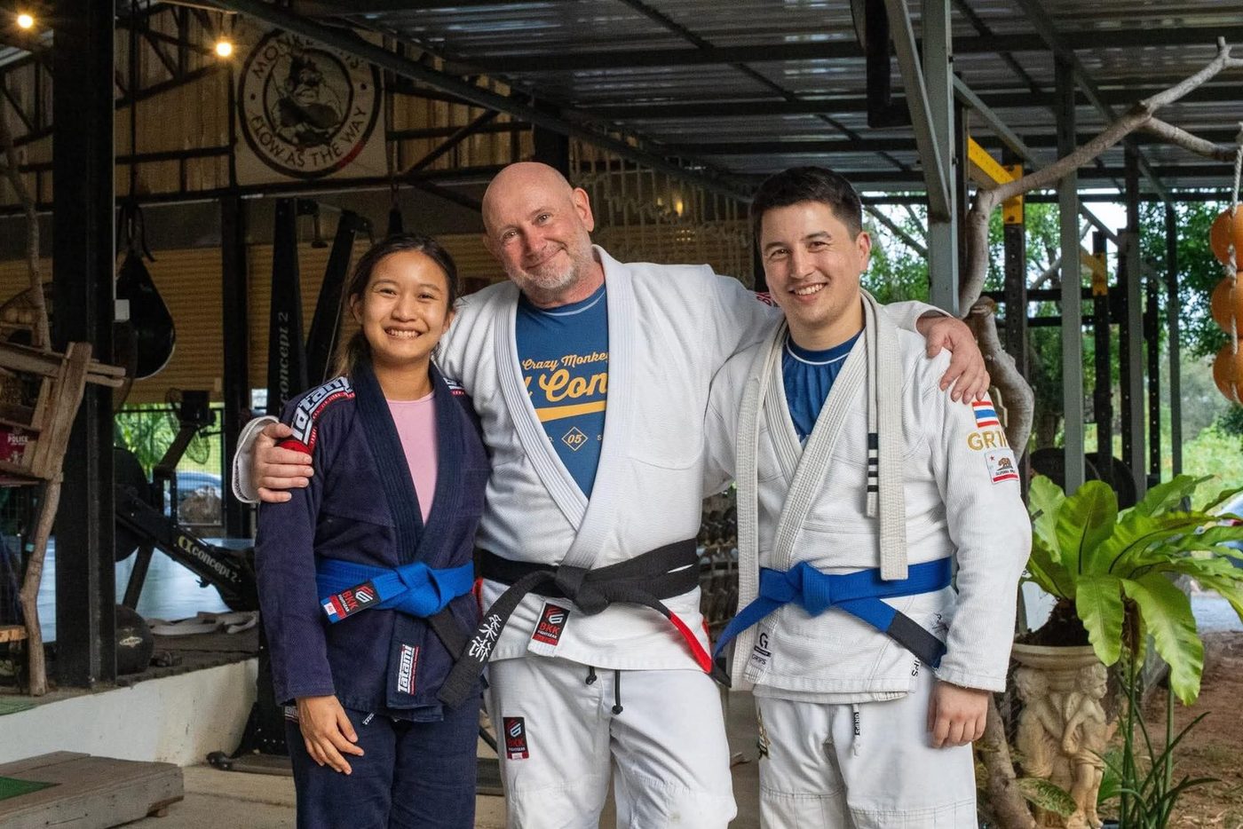 Psy with Aaron, the head coach, and Khan after a jiu-jitsu session at Tree Roots Retreat.