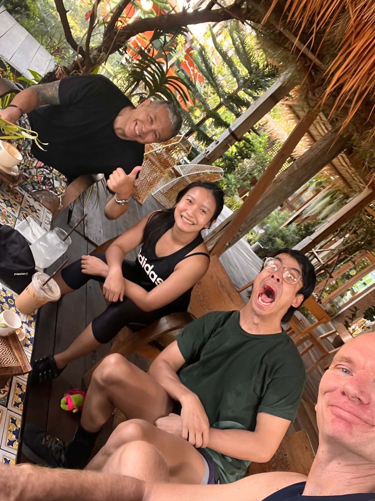 Michael and the Tree Roots Retreat team on the patio between training sessions.